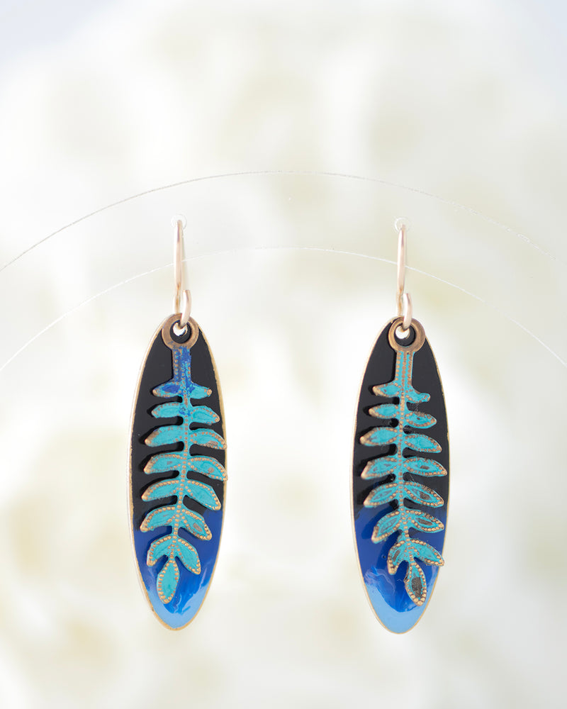 Hand patinaed ferns over shades of black and blues