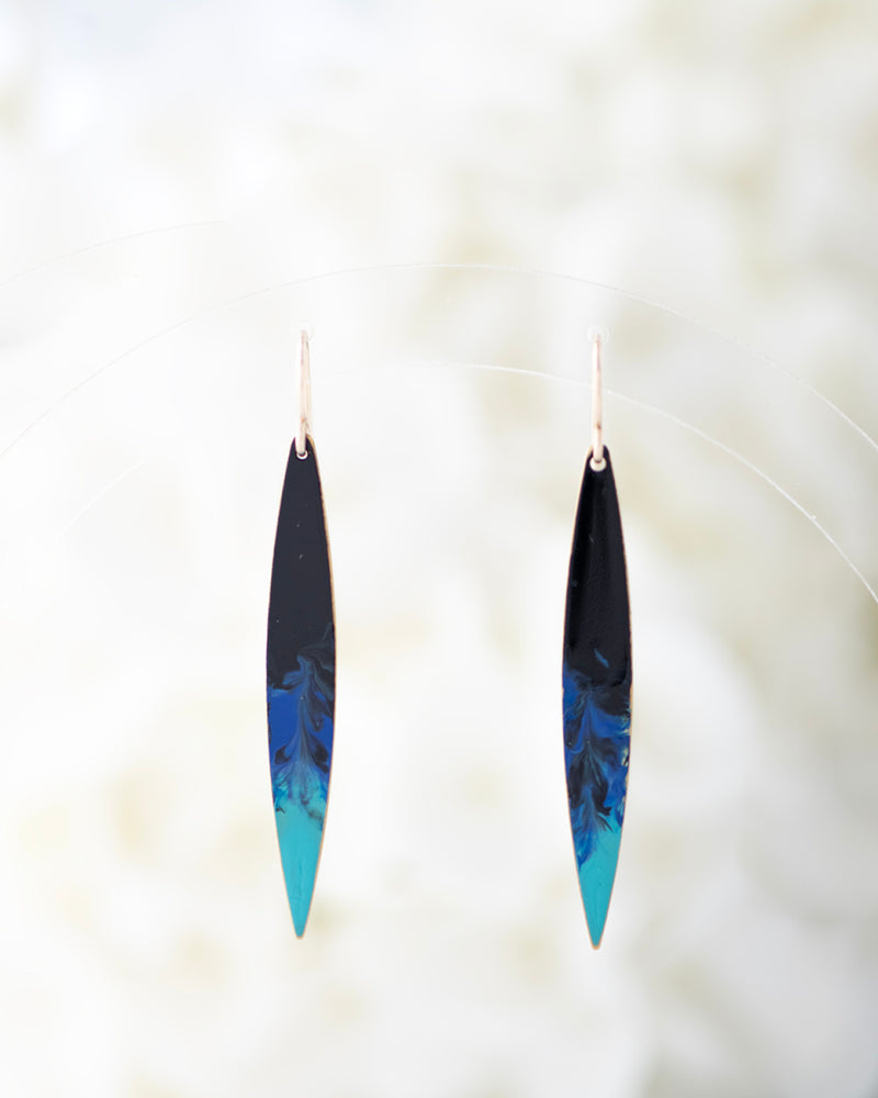 Hand patinaed brass drops in black to shades to blue ombre